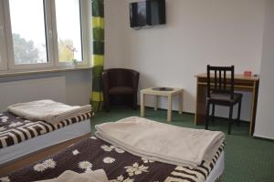 Łóżko lub łóżka w pokoju w obiekcie Warszawa Stare Bielany