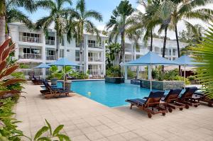 The swimming pool at or close to Palm Cove Paradise - Couples spa beach getaway