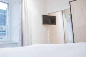Televisyen dan/atau pusat hiburan di Albergo Diffuso Porrentruy
