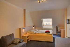 Postel nebo postele na pokoji v ubytování Hotel Žalý Apartmány