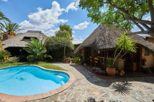 The swimming pool at or close to African Kwela Guest House