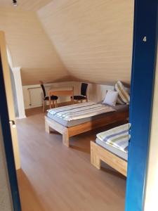 Postel nebo postele na pokoji v ubytování Eifelland-Ferien