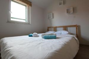מיטה או מיטות בחדר ב-Apartments Marko Rava