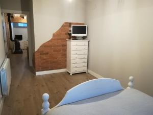 Łóżko lub łóżka w pokoju w obiekcie Urresillo Landetxea