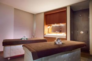 Postel nebo postele na pokoji v ubytování Relais Spa Chessy Val d'Europe