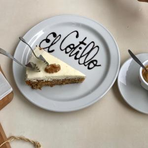 a piece of cake on a plate with the word death at Casa Natalie in Cotillo