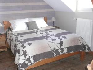 Кровать или кровати в номере Residence L'Etoile du Sancy