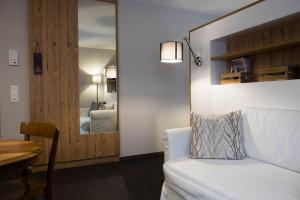 Postel nebo postele na pokoji v ubytování Hotel La Romantica