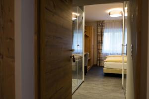Postel nebo postele na pokoji v ubytování Hotel La Romantica