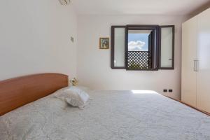 Letto o letti in una camera di Appartamento Solaris by BarbarHouse