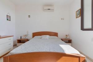 Letto o letti in una camera di Appartamento Solaris by BarbarHouse