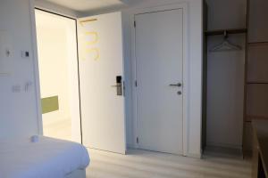 Postel nebo postele na pokoji v ubytování Corbie Lommel Ring