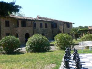 a chess board in front of a building at Pian della Casa in Montaione