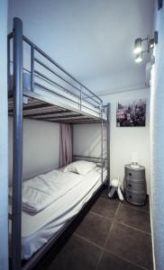 Giường trong phòng chung tại Le Ponant, Wifi, Piscine, Parking