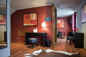 Posezení v ubytování Hotel Le Charme de la Semois