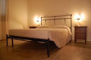 Cama ou camas em um quarto em L'Agave