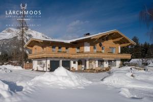 Appartements Lärchmoos im Winter