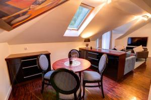 Posedenie v ubytovaní Apartamenty Parkowa