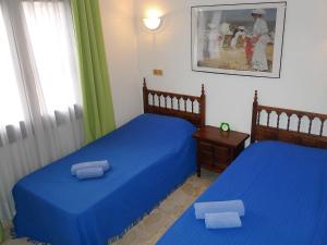 Postel nebo postele na pokoji v ubytování Holiday Home El Paradiso by Interhome