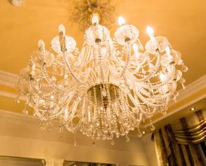 a chandelier hanging from a ceiling at Hotel Erdarelli in Rome
