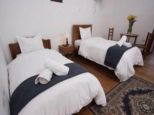 Voodi või voodid majutusasutuse Casa Union Cusco toas