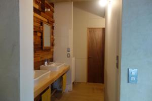 Ванна кімната в Tomarotto Hostel