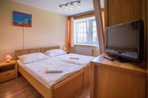 Postel nebo postele na pokoji v ubytování Penzion statek Bernard
