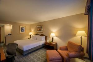a hotel room with two beds and a television at Holiday Inn Arlington at Ballston, an IHG Hotel in Arlington