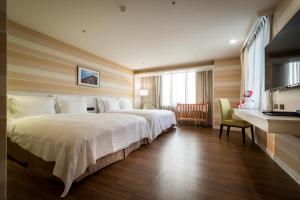 Llit o llits en una habitació de Wemeet Hotel