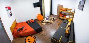TV a/nebo společenská místnost v ubytování Discovery Hotel