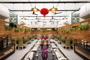 Restoran atau tempat lain untuk makan di Wemeet Hotel