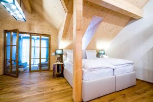 Postel nebo postele na pokoji v ubytování Hotel Rote19