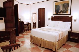 Katil atau katil-katil dalam bilik di Hotel La Recolección
