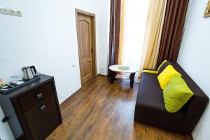 Posezení v ubytování Discovery Hotel