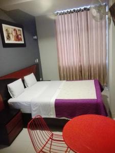 Cama o camas de una habitación en Hotel Vicente de la Vega