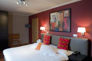 Postel nebo postele na pokoji v ubytování Hotel Le Charme de la Semois