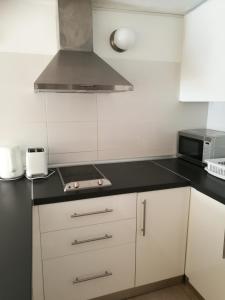 Kuchyň nebo kuchyňský kout v ubytování Aquarius Loft