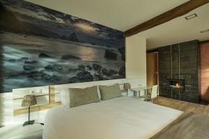 Cama o camas de una habitación en Urdaibai Etxea