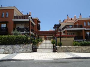 a building with a gate in front of it at Luxury Apartment in Monte Carrera , Arguineguin in La Playa de Arguineguín