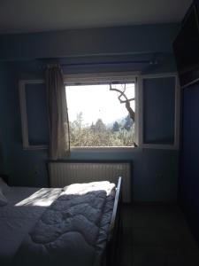 Postel nebo postele na pokoji v ubytování Ellenas- studios