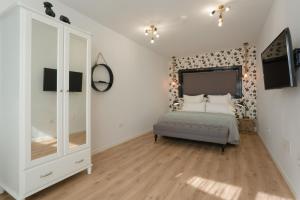 Posteľ alebo postele v izbe v ubytovaní La Concha Boutique Apartments - Adults Only