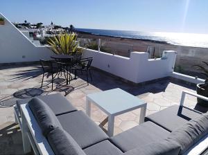 Posedenie v ubytovaní La Concha Boutique Apartments - Adults Only