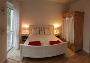 Ένα ή περισσότερα κρεβάτια σε δωμάτιο στο Ferienhaus Bergidylle