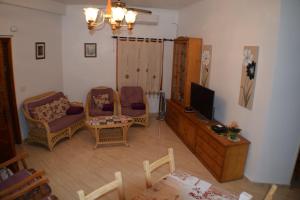 TV a/nebo společenská místnost v ubytování Casa en Torrevieja