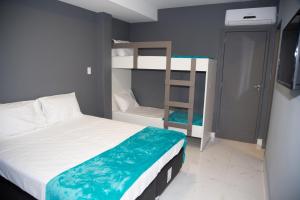 REF House Barra Da Tijuca客房内的一张或多张床位