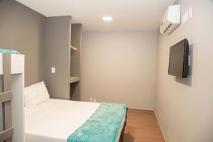 REF House Barra Da Tijuca客房内的一张或多张床位