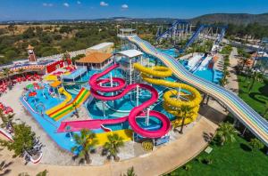 an aerial view of a water park with a water slide at 5***** LOFT Loulé Historical Center in Loulé