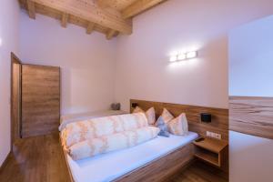 Łóżko lub łóżka w pokoju w obiekcie Gästehaus Runhof
