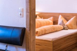 Łóżko lub łóżka w pokoju w obiekcie Gästehaus Runhof