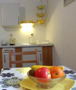 Kuchyň nebo kuchyňský kout v ubytování Apartments Leut